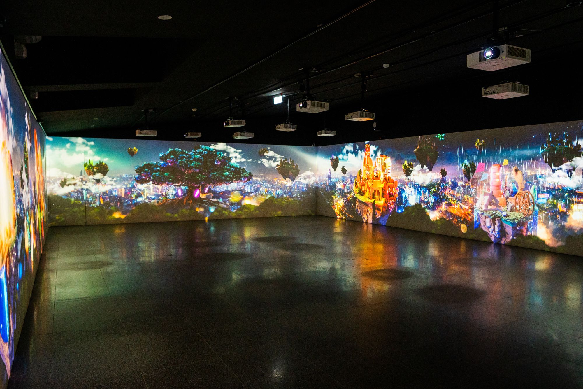 Wide view of the gallery with the full projection running.