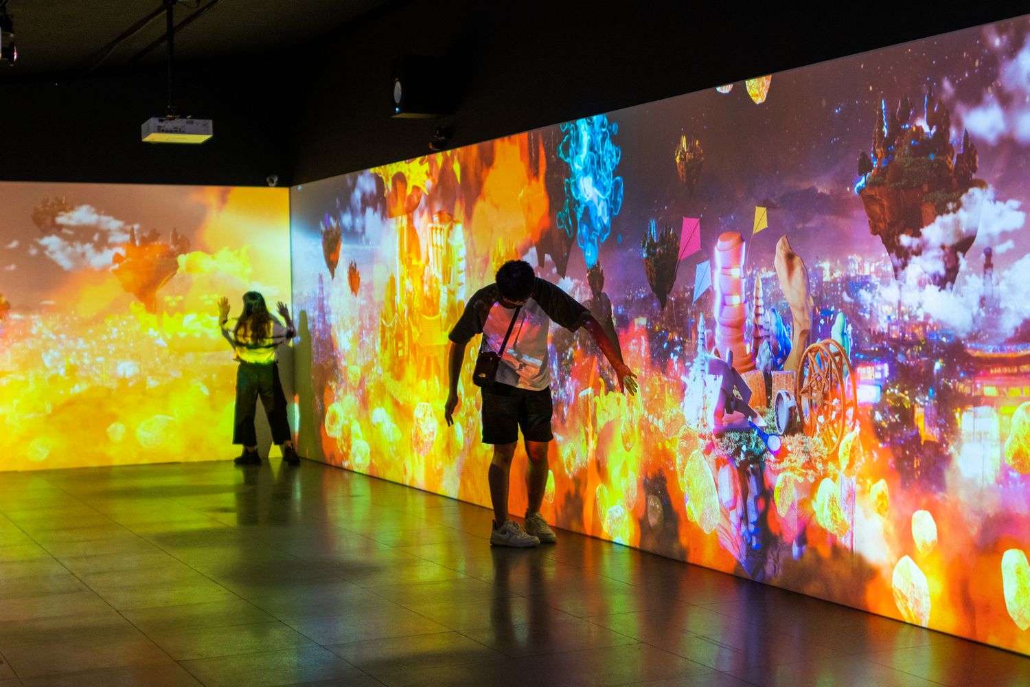 Visitors spread across the gallery floor.